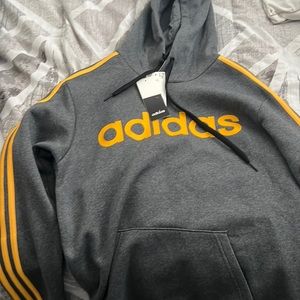Grey and orange Adidas hoodie